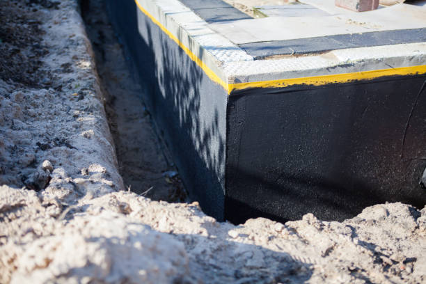 Professional Waterproofing technician working in Sidney, OH